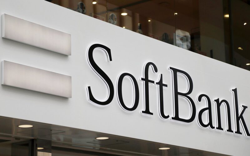 Signage for SoftBank Group Corp. is displayed outside one of the company's stores in Tokyo, Japan, on Tuesday, May 9, 2016. SoftBank on July 18, 2016, agreed to buy ARM Holdings Plc for 24.3 billion pounds ($32 billion), securing a slice of virtually every mobile computing gadget on the planet and future connected devices in the home. Photographer: Tomohiro Ohsumi/Bloomberg