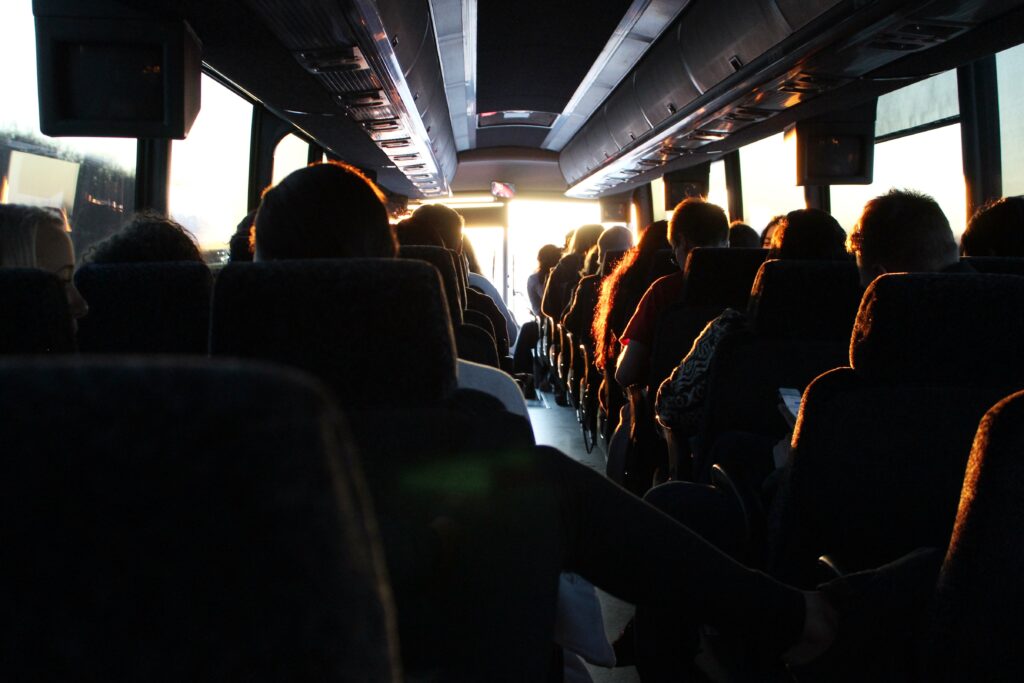 People riding passenger bus