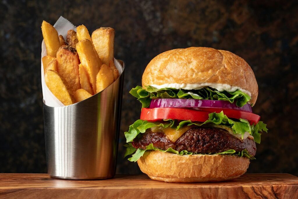 Burger with lettuce and fries photo