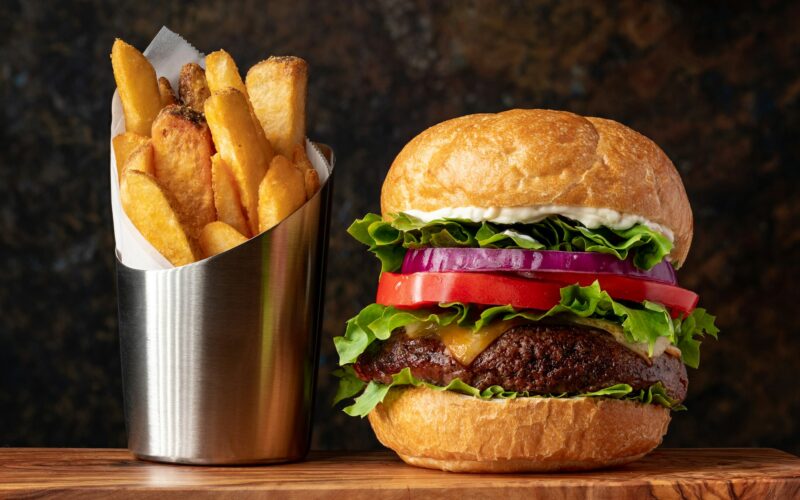 Burger with lettuce and fries photo